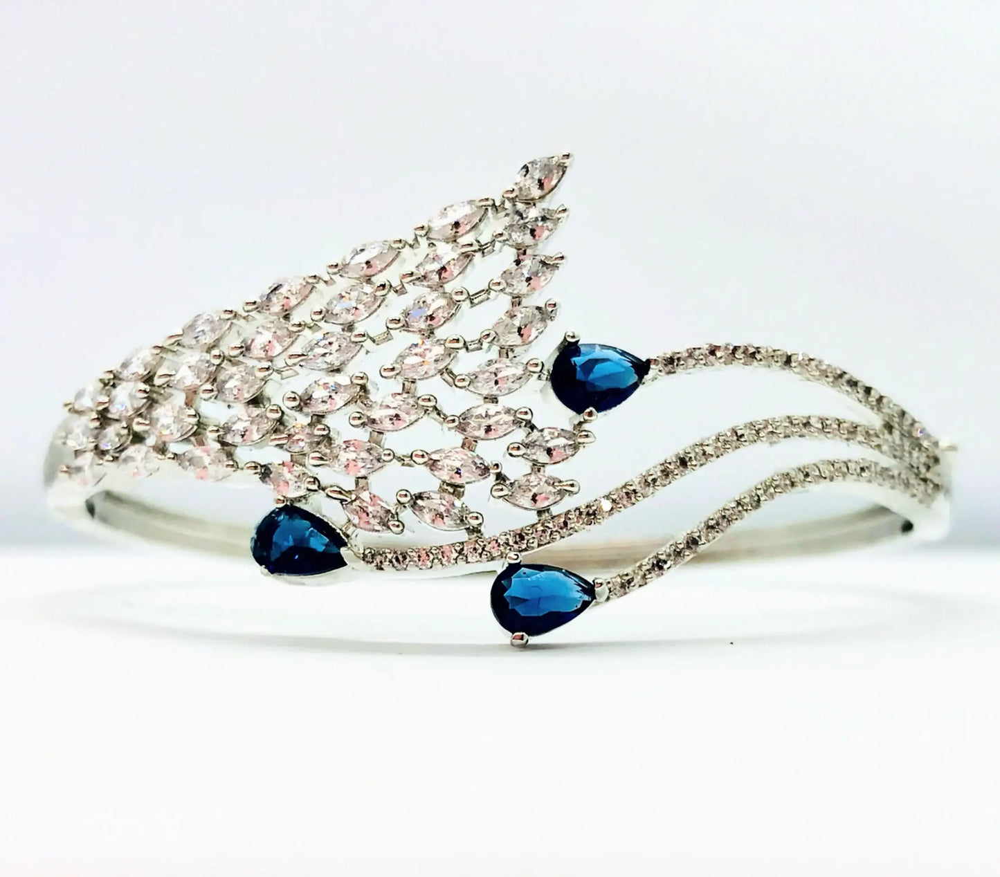 Sophisticated Silver Bracelet Embellished with Blue Gemstones