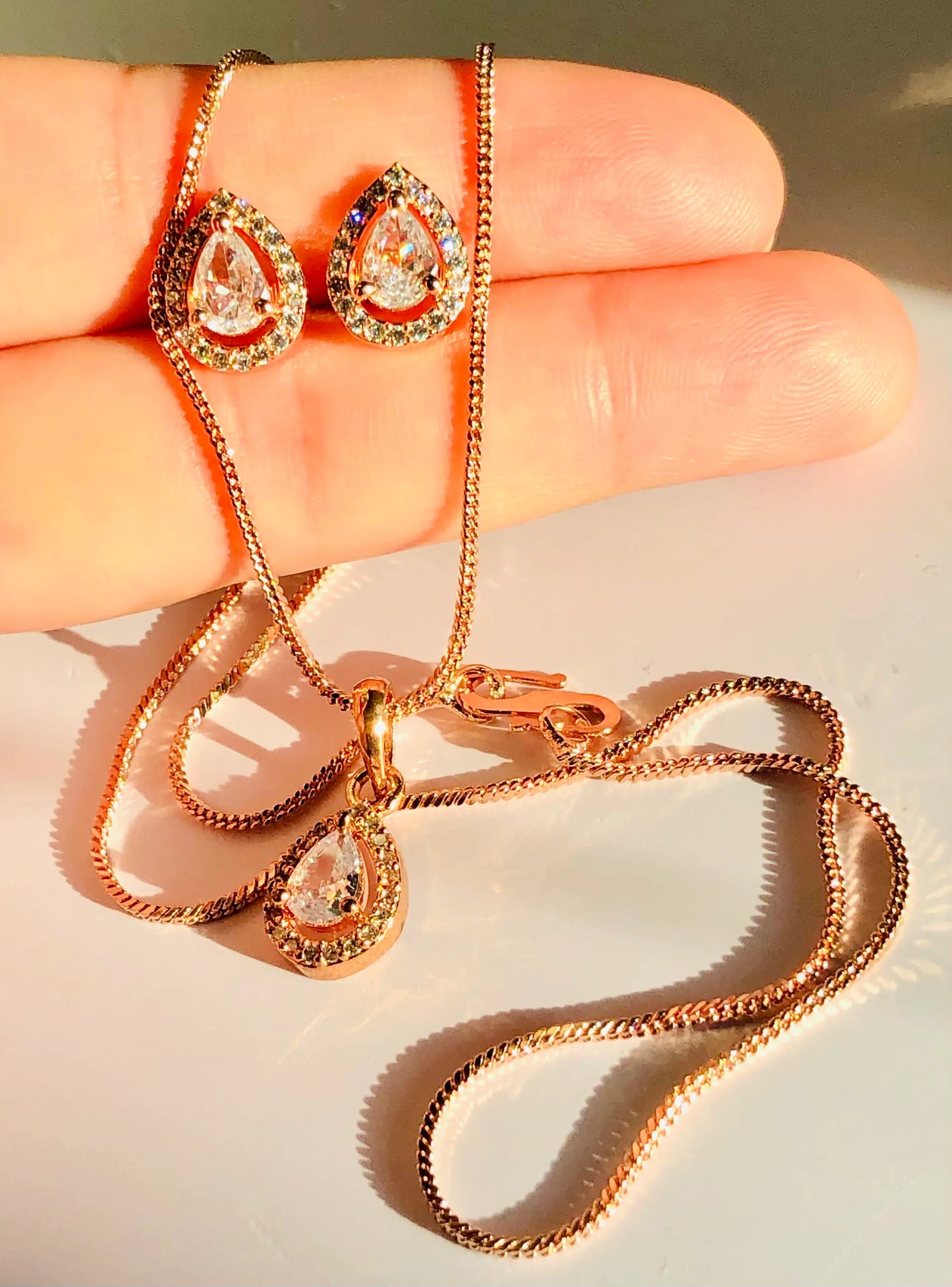 Elegant Teardrop Rose Gold Pendant Set Adorned with White Gemstones