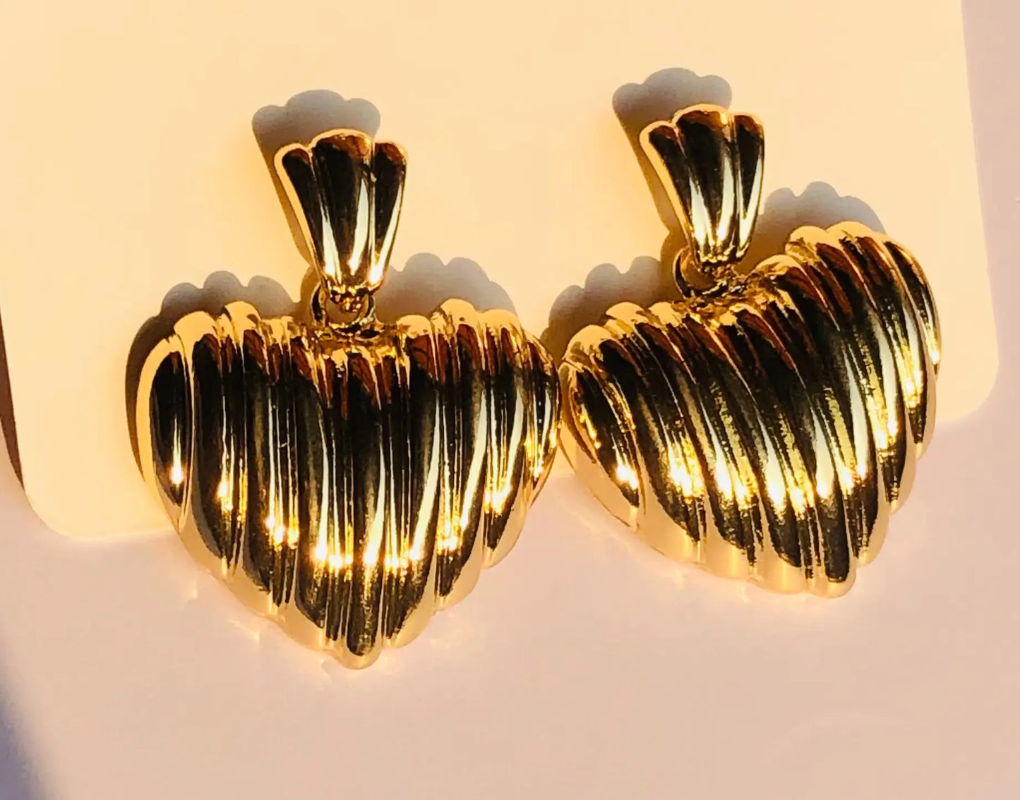 Elegant Golden Heart Dangle Earrings for Any Occasion